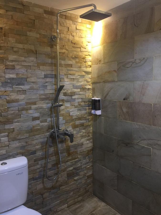 Cosmy Orchard Apartment Surabaya Esterno foto