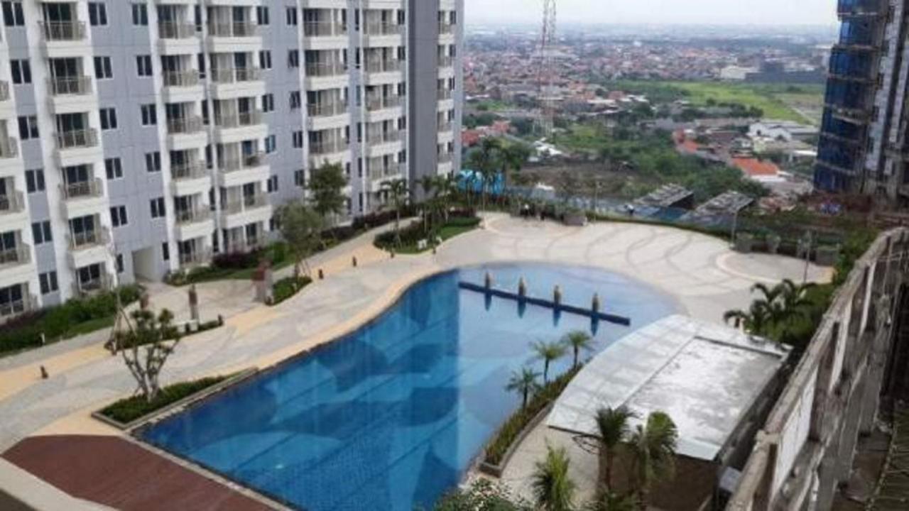 Cosmy Orchard Apartment Surabaya Esterno foto
